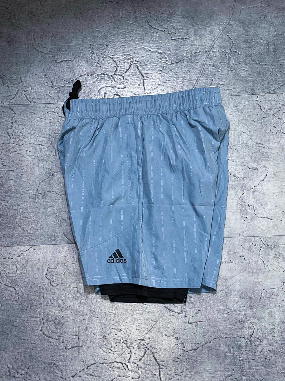 Pantaloneta Adidas Azul Cielo con Licra Interior