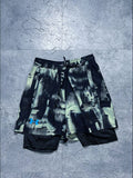 Pantaloneta Under Armour Estampada con Licra Interior