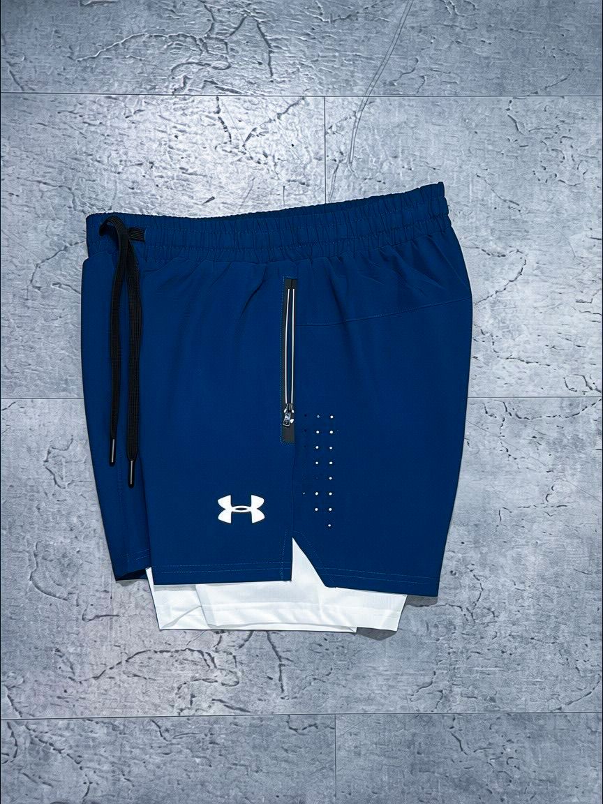 Pantaloneta Under Armour Azul con Licra Interior