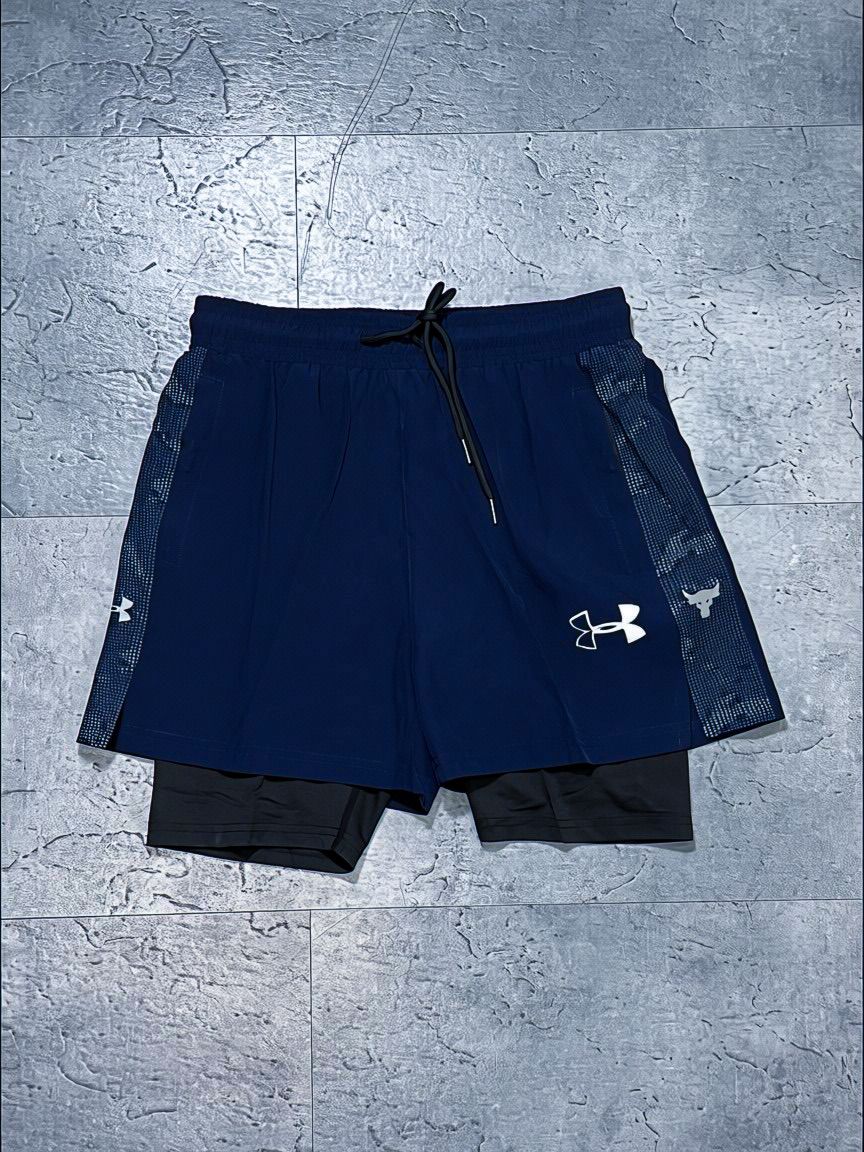 Pantaloneta Under Armour Azul Marino con Licra Interior